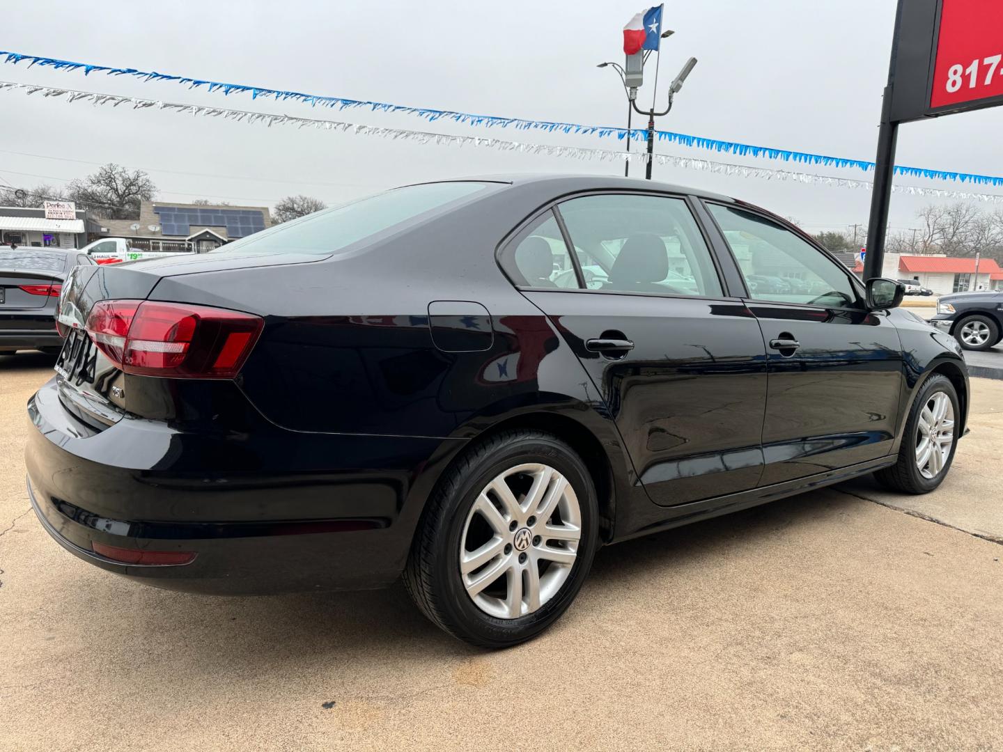 2018 BLACK VOLKSWAGEN JETTA 1.4T S (3VW2B7AJ4JM) , located at 5900 E. Lancaster Ave., Fort Worth, TX, 76112, (817) 457-5456, 0.000000, 0.000000 - This is a 2018 VOLKSWAGEN JETTA 4 DR SEDAN that is in excellent condition. The interior is clean with no rips or tears or stains. All power windows, door locks and seats. Ice cold AC for those hot Texas summer days. It is equipped with a CD player, AM/FM radio, AUX port, Bluetooth connectivity and S - Photo#3